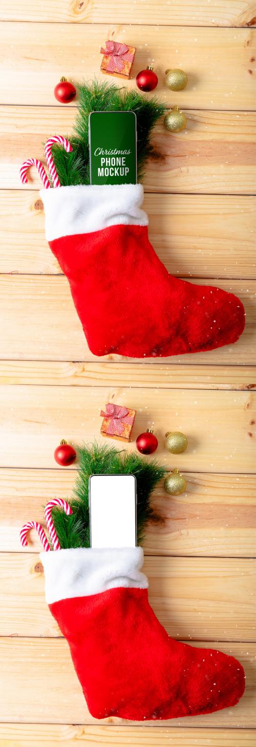 Phone in a Christmas Stocking Mockup - 466042039
