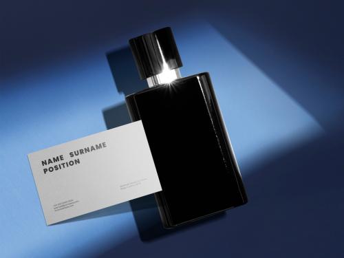 Business Card Mockup with Perfume Bottle - 472895795