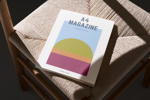 A4 Magazine on a Chair Mockup - 476478972