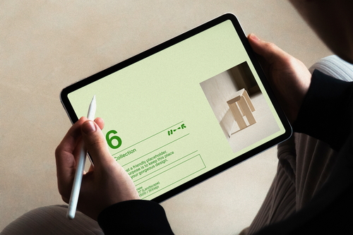 Casual Handheld iPad Pro Mockup — LUX-16