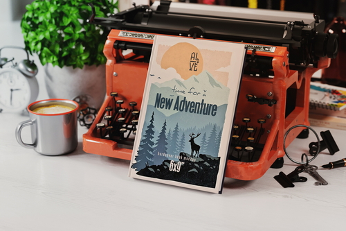 Hardcover Book Near Old Typewriter Mockup