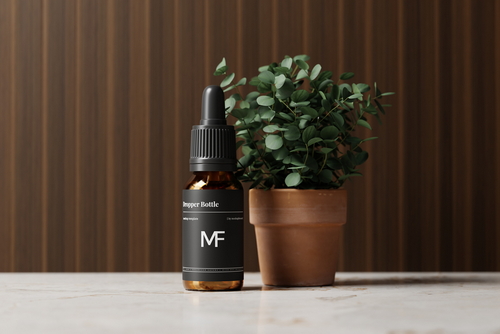 Amber Glass Dropper Bottle with Eucalyptus Plant Mockups