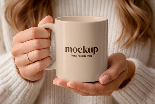 Hand Holding Mug Mockup