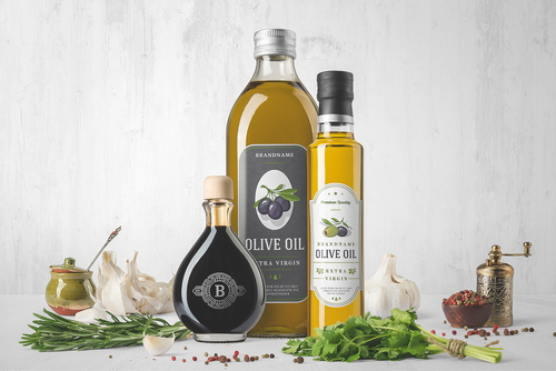 Oil Bottles and Herbs Packaging Mockup Scene 02