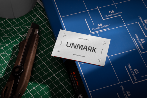 Business Card on Paper Cutter PSD Mockup
