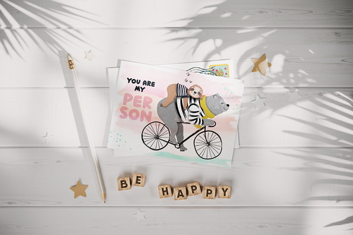 Postcard on the White Wooden Surface Mockup