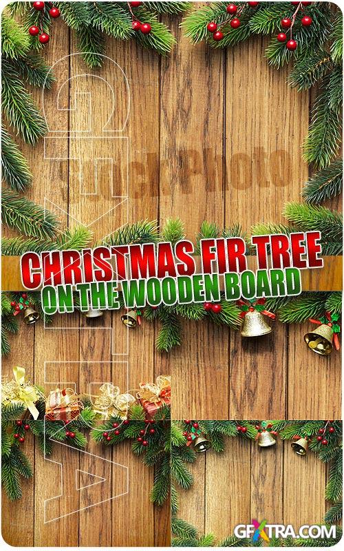 Christmas fir tree on the wooden board - UHQ Stock Photo