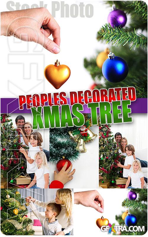 Peoples decorated xmas tree - UHQ Stock Photo