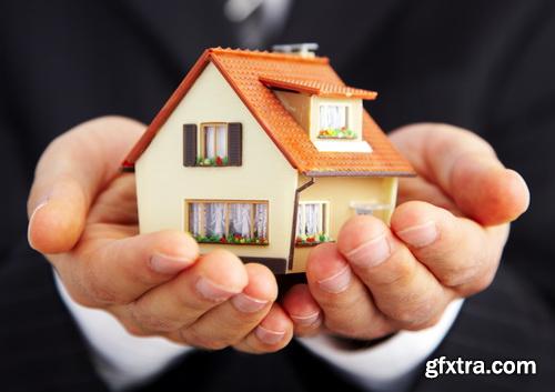 Real Estate Agent with House Model & Keys 30xJPG Real Estate Agent with House Model & Keys 30xJPG