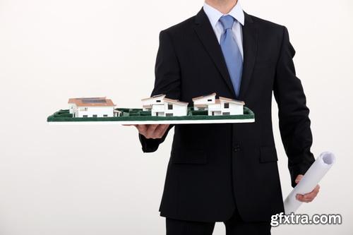 Real Estate Agent with House Model & Keys 30xJPG Real Estate Agent with House Model & Keys 30xJPG