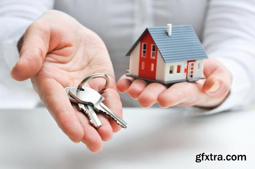 Real Estate Agent with House Model & Keys 30xJPG Real Estate Agent with House Model & Keys 30xJPG