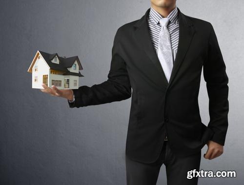 Real Estate Agent with House Model & Keys 30xJPG Real Estate Agent with House Model & Keys 30xJPG