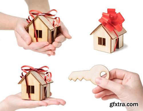 Real Estate Agent with House Model & Keys 30xJPG Real Estate Agent with House Model & Keys 30xJPG