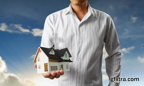 Real Estate Agent with House Model & Keys 30xJPG Real Estate Agent with House Model & Keys 30xJPG