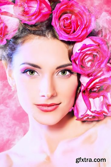 Stock Photos - Portrait of a Happy Beautiful Young Woman with Roses in Her Hair
