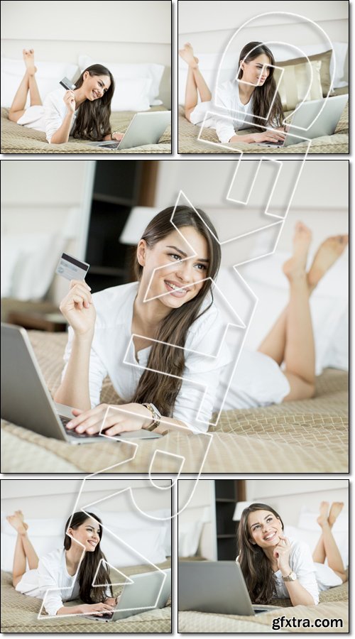 Woman in the bed with laptop - Stock photo