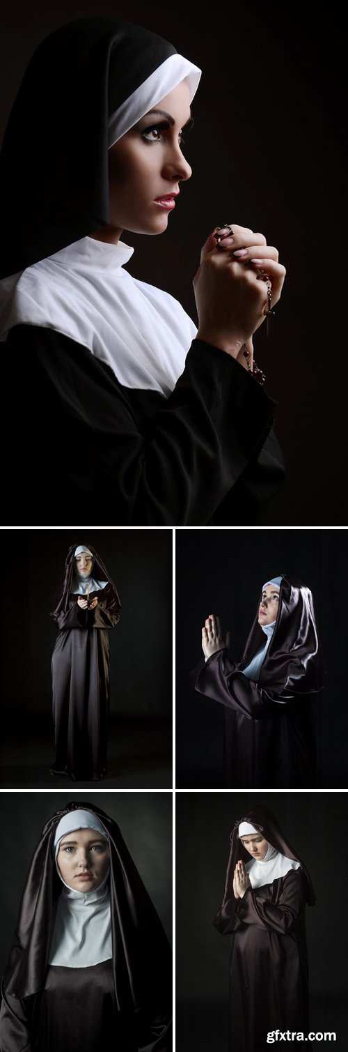 Stock Photos - Young girl catholic nun holding candle