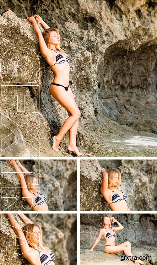 Stock Photos - Young blonde girl in bikini leaning over a rock on sunny summer day. Beauty concept