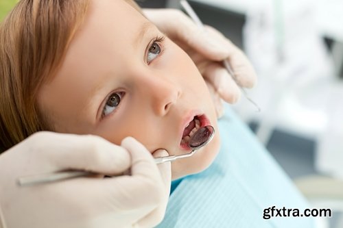 Skillful young female and man dentist - 20 UHQ JPEG