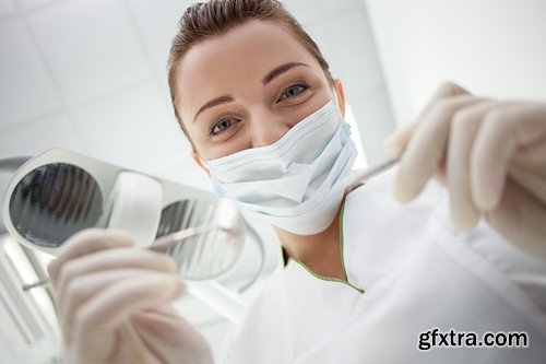 Skillful young female and man dentist - 20 UHQ JPEG