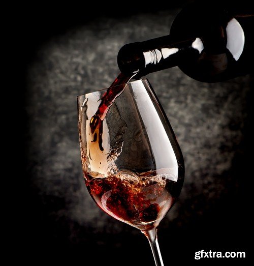 Glass of red wine on a black background