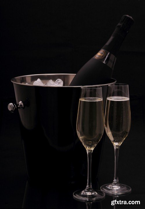 Champagne in a cooler on a black background