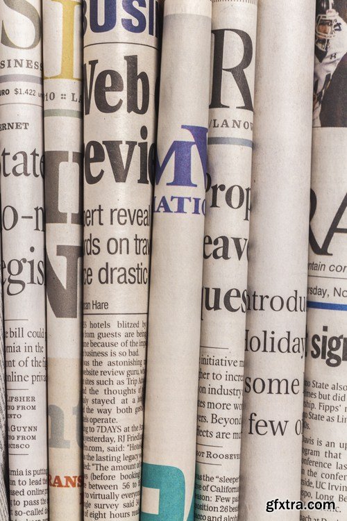 Close-up of folded newspapers 10X JPEG