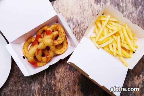 Onion rings and french fries - 19xUHQ JPEG Photo Stock