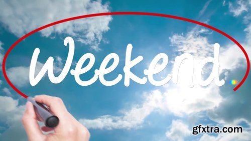 Weekend - Concept with Hand Writing on the Sky. Man Writing Weekend - Concept with Hand Writing on the Sky. Man Writing