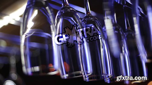 Wine Glasses Hanging Above the Bar at a Nightclub Wine Glasses Hanging Above the Bar at a Nightclub