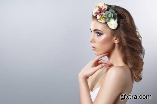 Delicate Spring Beauty Portrait of a Beautiful Girl with a Wreath of Flowers on His Head Isolated