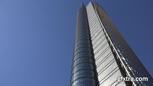4K Modern Tall Tower Glass Facade Blue Sky Skyscraper Office Building Futuristic