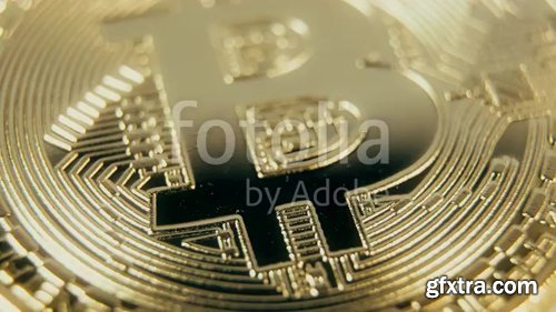 Crypto currency Gold Bitcoin - BTC - Bit Coin. Macro shots crypto currency Bitcoin coins rotating. Seamless looping