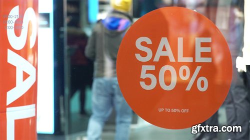 Sale sign at the showcase store. Holiday sales in the city center 2