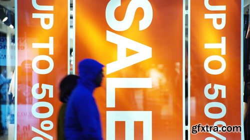 Sale sign at the showcase store. Holiday sales in the city center