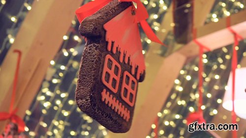 Souvenir cookies decorated with winter ornament, hunging retail trade at christmas fair on street