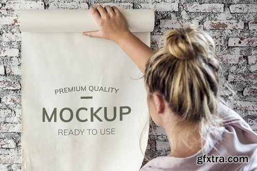 Rear view of a woman holding a paper roll mockup