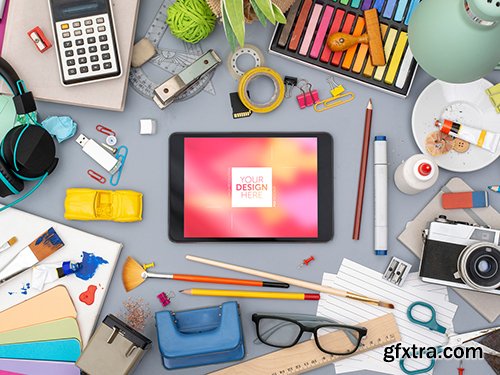 Desk with Tablet and Colorful Art Supplies Mockup 245404736