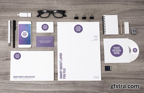 Smartphone, Tablet, and Stationery on Light Wooden Desk Mockup 3 124668205