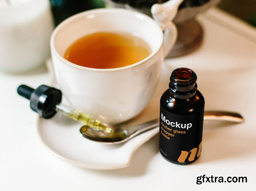 amber-glass-dropper-bottle-with-tea-mockup_172751-19 amber-glass-dropper-bottle-with-tea-mockup_172751-19