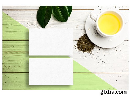 Business Cards on Green and White Table Mockup 208419700 Business Cards on Green and White Table Mockup 208419700