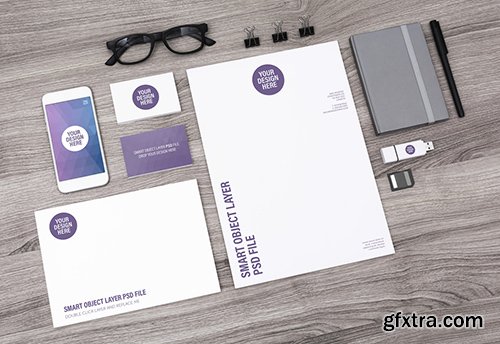 Smartphone and Stationery on Light Wooden Desk Mockup 1 124671894