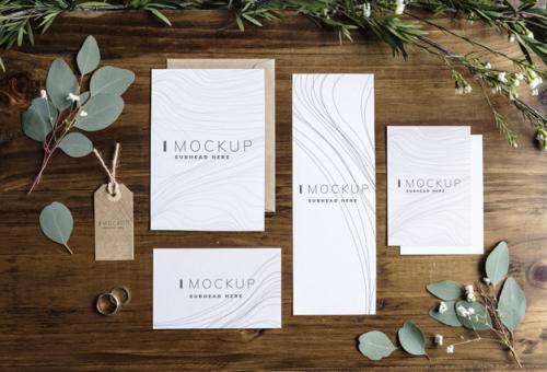 Business Stationary Design Mockups On A Wooden Table Premium PSD