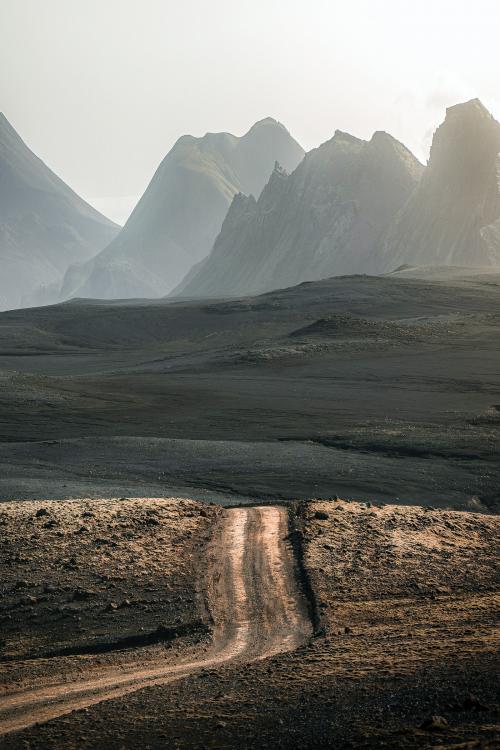 Scenic view of dirt road at Highlands in Iceland - 2092660