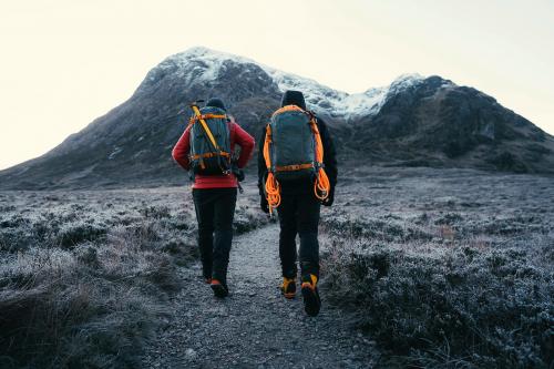 Hikers at Glen Coe valley in the Scottish Highlands - 2097781