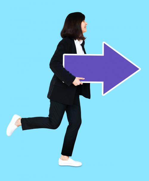 Cheerful businesswoman running with a purple arrow - 493306