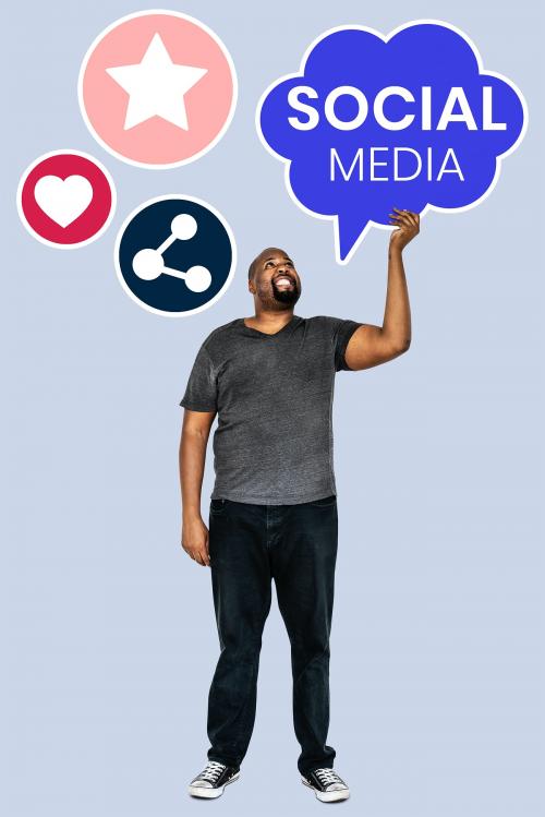 Man holding social media symbols - 493151