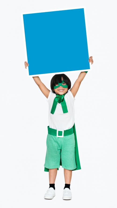 Young superhero with an empty square board - 491650