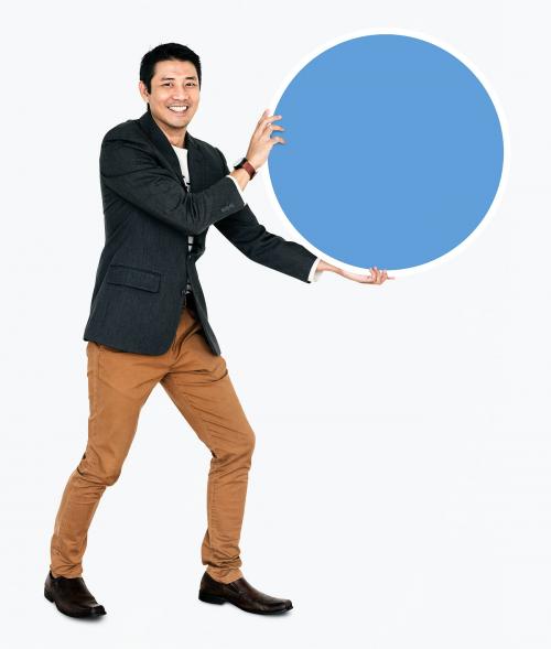 Cheerful businessman holding a blue round board - 490982