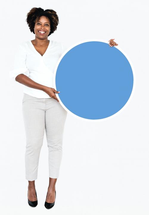 Cheerful businesswoman holding a blue round board - 490983